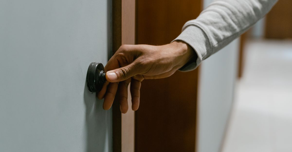 locksmith hands door — Naperville Pro Locksmiths
