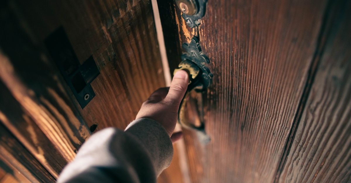 locksmith hands door — Naperville Pro Locksmiths